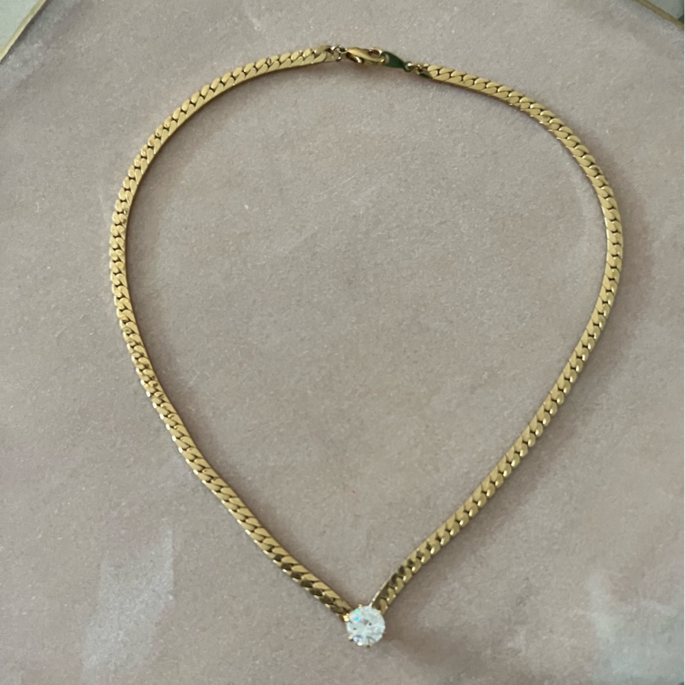 Gold Tone Herringbone Necklace with Solitaire Crystal Pendant